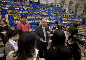 RESOLVE: City Councilmember Tony Avella from Queens talks to the media about his resolution to have hate crime charges brought against the perpetrators of violence in Flushing against Falun Gong practitioners. (Edward Dai/The Epoch Times)