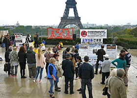 Image for article Paris, France : Conjuguer les efforts pour mettre fin à la persécution du Falun Gong et traduire Jiang Zemin en justice