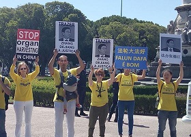 Image for article Lisbonne, Portugal : Les pratiquants manifestent contre la visite d'un responsable chinois pour persécution du Falun Gong