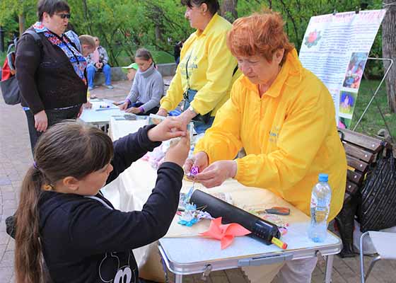 Image for article Russie : Présentation du Falun Dafa lors de la célébration de la Journée de la ville d'Angarsk