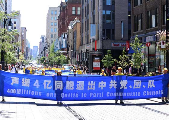 Image for article Montréal : Le public exprime son soutien lors du défilé organisé pour célébrer les 400 millions de personnes ayant démissionné du PCC