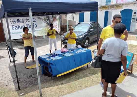 Image for article Les Caraïbes : Les pratiquants de Falun Dafa dénoncent les crimes du PCC à l’occasion du 24<SUP>e</SUP> anniversaire des efforts déployés pour mettre fin à la persécution