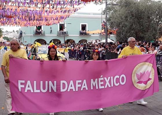 Image for article Mexique : Le Falun Dafa accueilli au défilé de la foire de Tlaxcala 2023