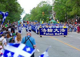 Image for article Le cortège du Falun Gong est un grand moment lors du défilé de la Fête nationale du Québec