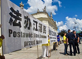 Image for article Pologne : Les pratiquants de Falun Gong manifestent lors de la visite d'un responsable chinois