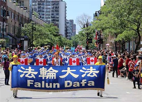 Image for article Le Falun Dafa reçoit un accueil chaleureux au sein du défilé de la fête du Canada à Montréal