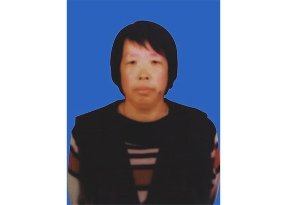 Image for article Une femme alitée et guérie par le Falun Gong, condamnée pour avoir distribué des documents sur sa croyance