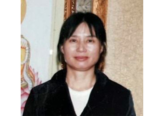 Image for article Une femme emprisonnée pour avoir raconté comment son cancer avancé de la pulpe dentaire a été guéri par le Falun Gong