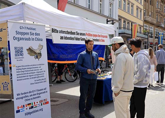 Image for article Allemagne : Habitants et touristes condamnent la persécution du Falun Dafa lors d’une activité au lac de Constance (3<SUP>e</SUP> partie)
